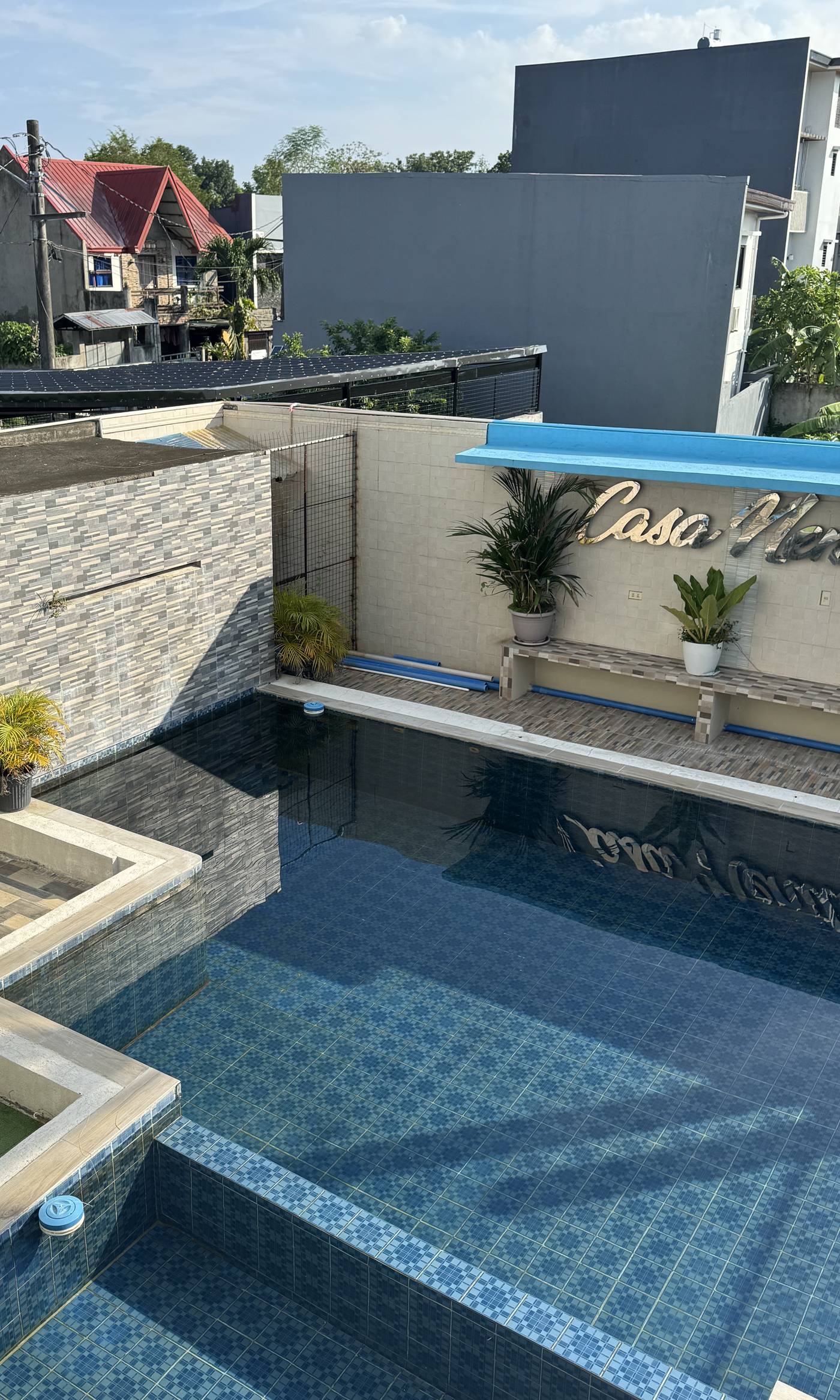 The pool and deck in daylight